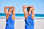 Man, friends and stretching back in fitness on beach for workout, exercise or outdoor training in sports. Rear view of muscular, athlete or male person in body warm up together on the ocean coast
