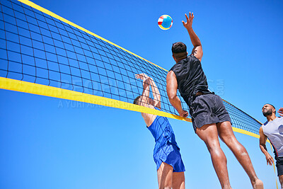Buy stock photo Beach volleyball match, blue sky and sports team jump, playing competition and practice for tournament challenge. Below view, athlete action and people in air workout, training or nature exercise