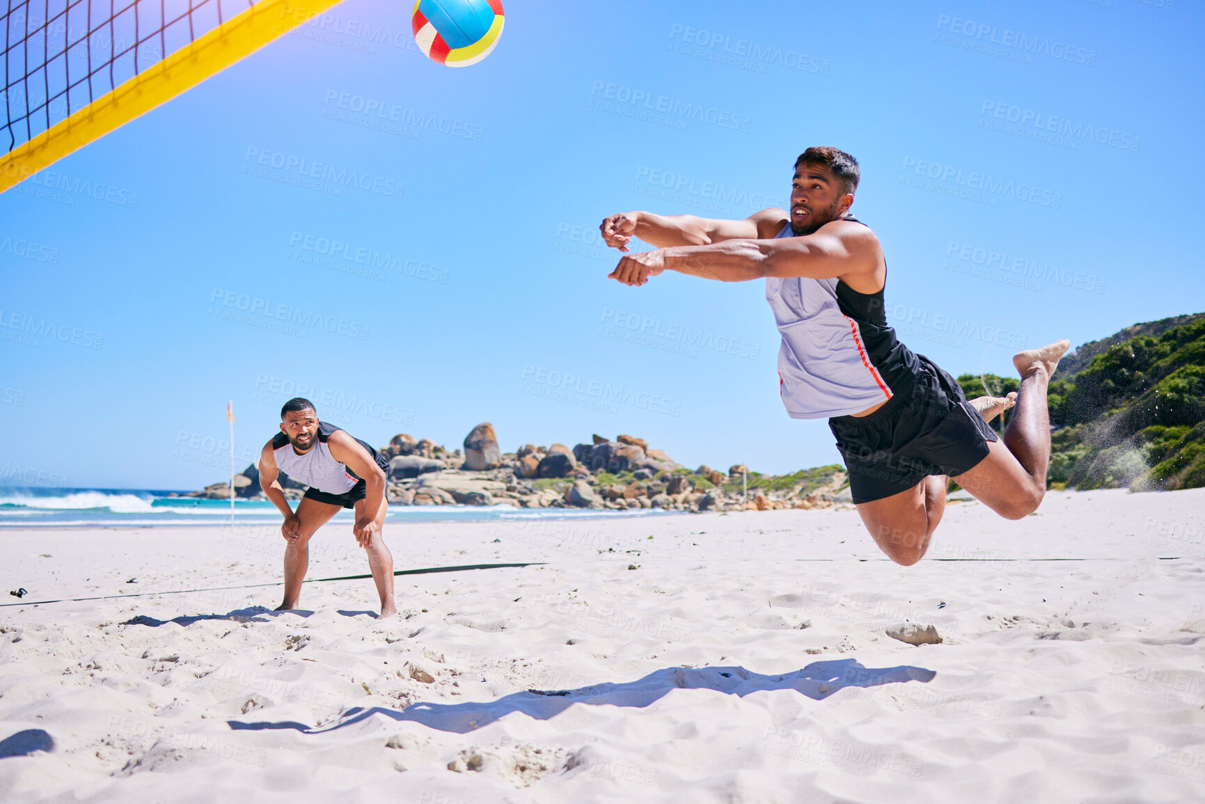 Buy stock photo Man, game and playing volleyball on beach in sports, match or score point in outdoor fitness or exercise. Active male person in teamwork, spike or ball over net in practice or training on ocean coast