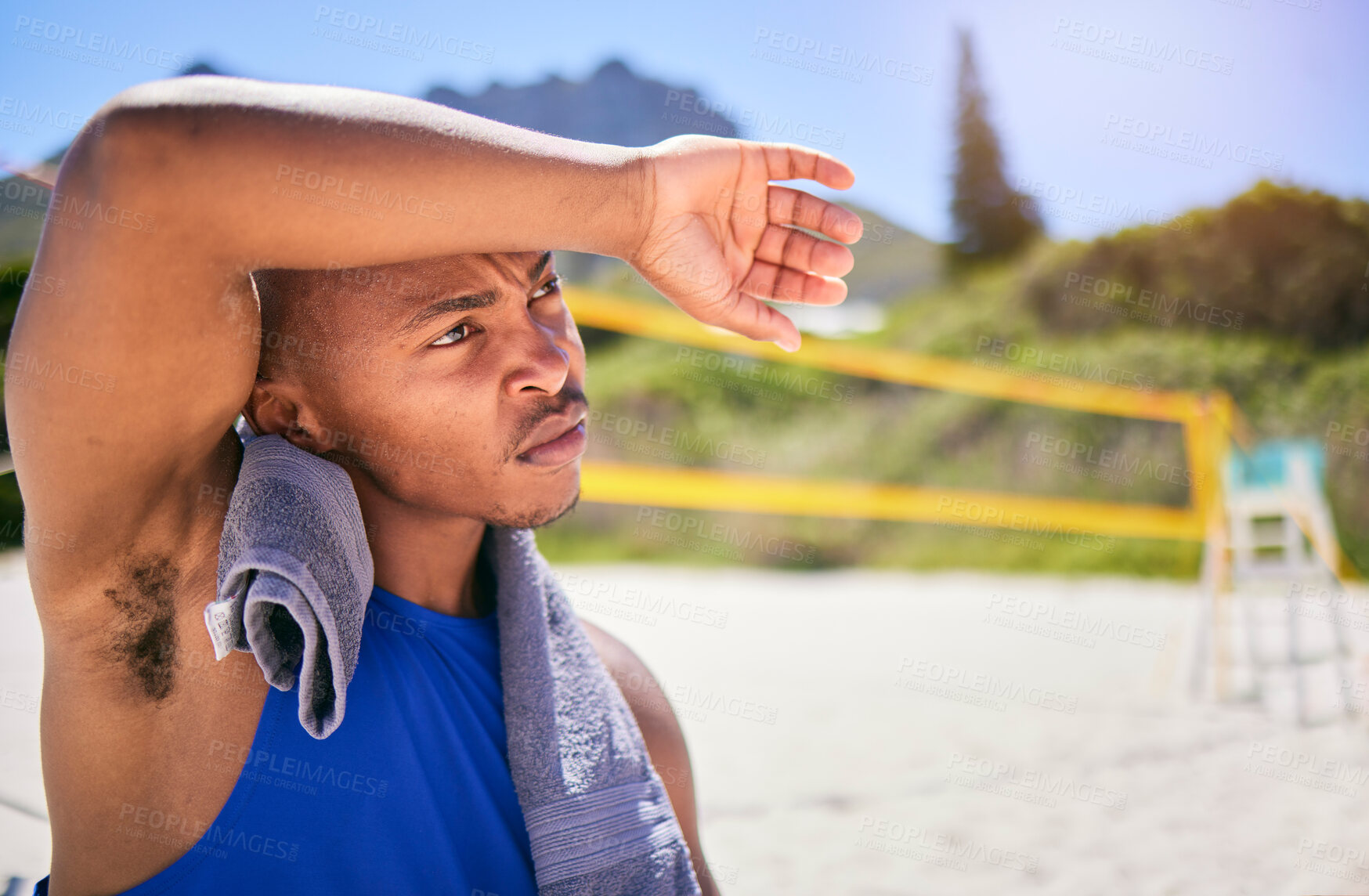 Buy stock photo Tired man, volleyball and sports fitness on beach in match, game or intense outdoor competition in sun. Exhausted male person or player in sweat, break or rest after workout, exercise or training