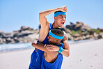 Happy man, volleyball and hug in celebration on beach in winning, success or teamwork in fitness. Excited male person fist in team sport, game or match in victory, score or achievement on ocean coast