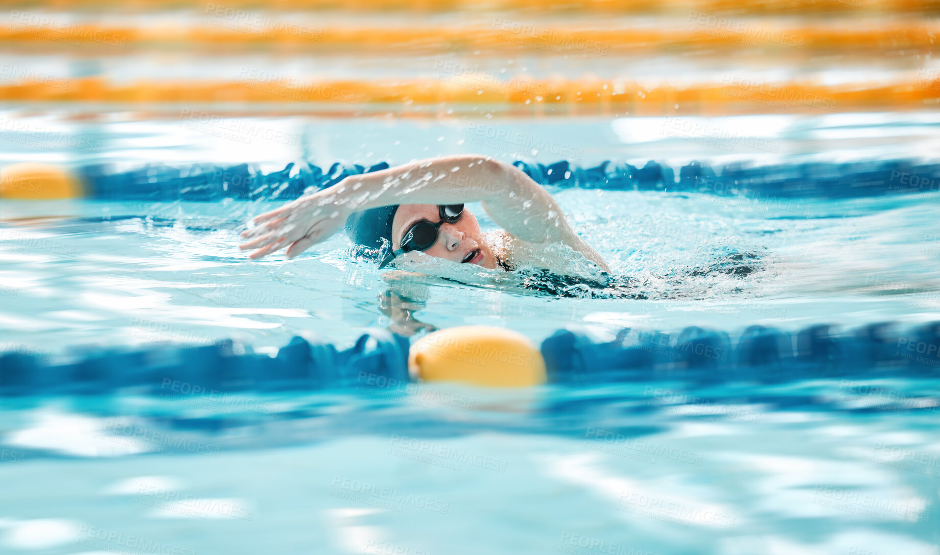 Buy stock photo Woman, pool and swimming in sports fitness, exercise or training in water splash or athletics. Female person, athlete or professional swimmer in competition, race or marathon in workout practice