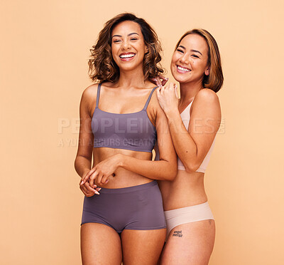 Buy stock photo Beauty, diversity and smile with portrait of women in studio for health, body and cosmetics. Spa, self love and skincare with people on beige background for support, pride and solidarity on mockup