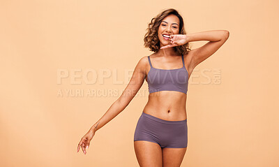 Buy stock photo Happy portrait, lingerie and body of woman in studio isolated on brown background mockup space. Smile, underwear and model in natural beauty, self love or confidence in positivity, health or wellness