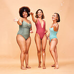 Summer, party and portrait of women with bubbles or inclusion of friends in studio background or swimming fashion. Swimsuit body, diversity and group of people for fun vacation beauty and skincare