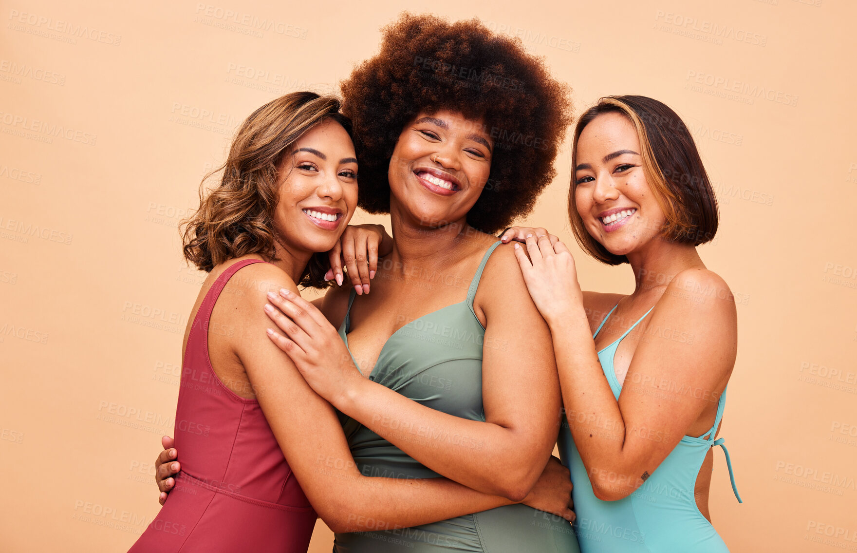 Buy stock photo Diversity, bikini and portrait of women hug together happy for beach vacation isolated in a studio brown background. Smile, beauty and happy friends ready for summer holiday in swimsuit fashion 