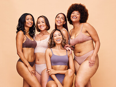 Buy stock photo Portrait, diversity and women with beauty, health and body positivity on a beige studio background. Models, skincare or group with inclusion, support or wellness with self love, aesthetic and friends