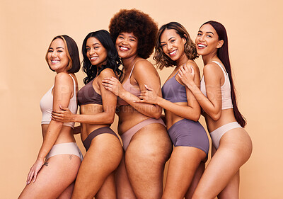 Buy stock photo Body positive, diversity and portrait of women happy in studio for wellness, beauty and self love. Underwear campaign, natural and people on brown background for confidence, skincare and inclusion