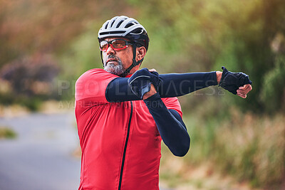 Buy stock photo Man, cyclist and stretching arms on mountain in sports fitness, workout or outdoor exercise in nature. Active male person or athlete in body warm up, cycling or ready for cardio marathon or training