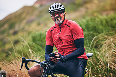 Buy stock photo Fitness, cycling and phone with portrait of man on bike in nature for sports, training and social media. Contact, communication and health with mature person in mountains for energy, freedom and app