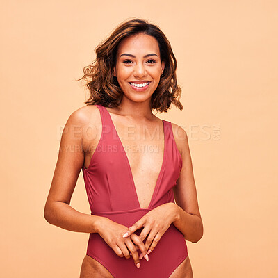 Buy stock photo Happy, fashion and swimsuit with portrait of woman in studio for summer, tropical and wellness. Beach, vacation and beauty with person on beige background for confident, holiday and self love mockup