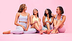 Talking, group and women with fitness, exercise and conversation on a pink studio background. Funny, girls and friends with communication, laughing and pilates training with wellness, relax or health