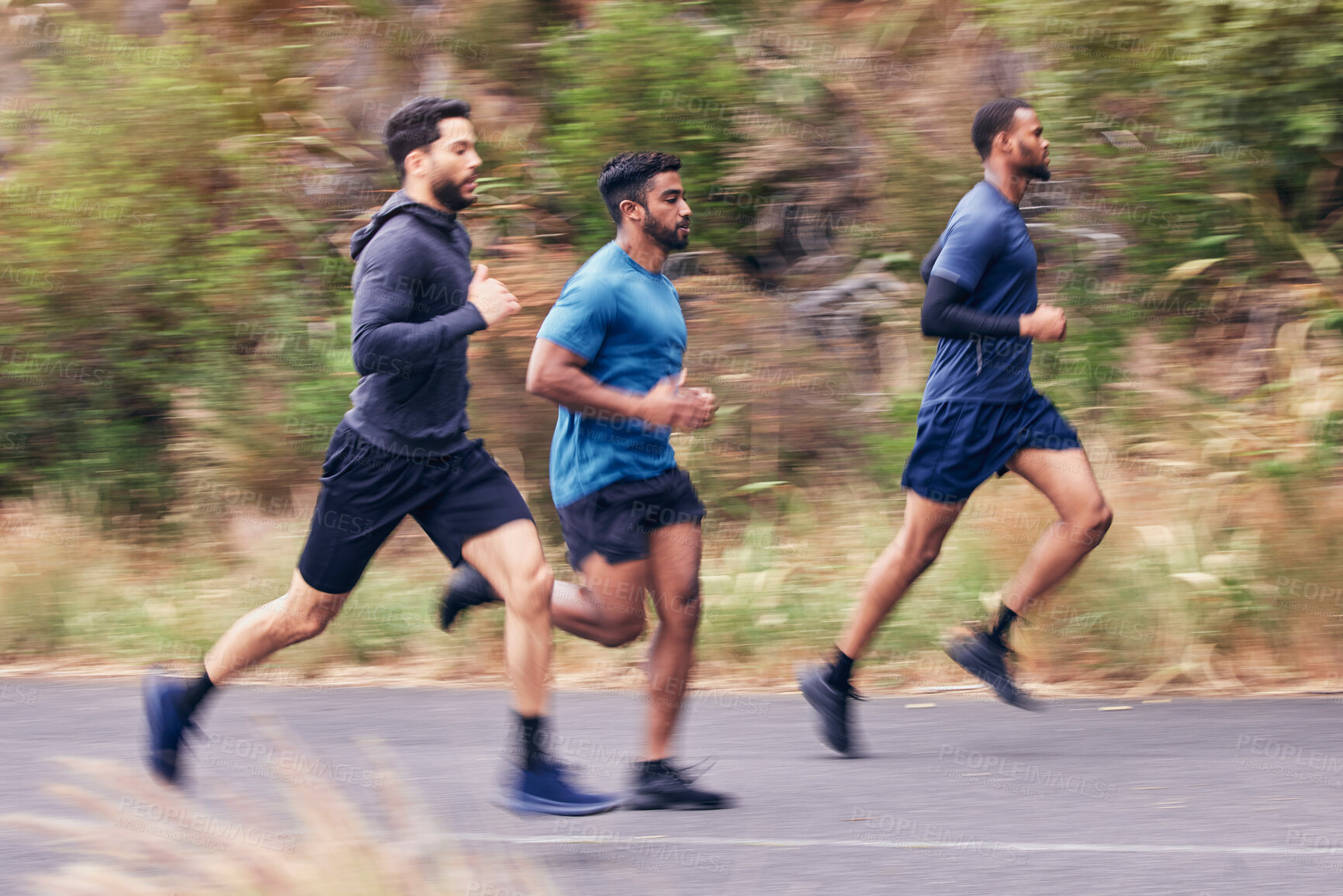 Buy stock photo Men, fitness and running friends in a road for training, speed and energy, health and cardio routine in nature. Sports, diversity and man group on practice run for competition, workout or performance