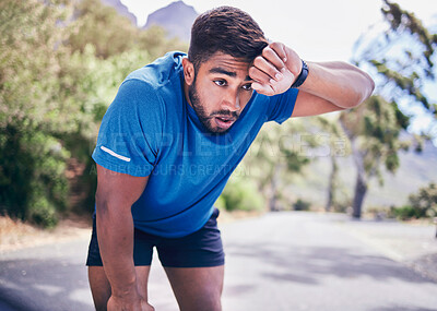 Buy stock photo Man, tired and sweating for sports training, exercise break and workout challenge in nature park. Indian athlete, runner and breathe for fitness rest, outdoor running and fatigue of cardio marathon