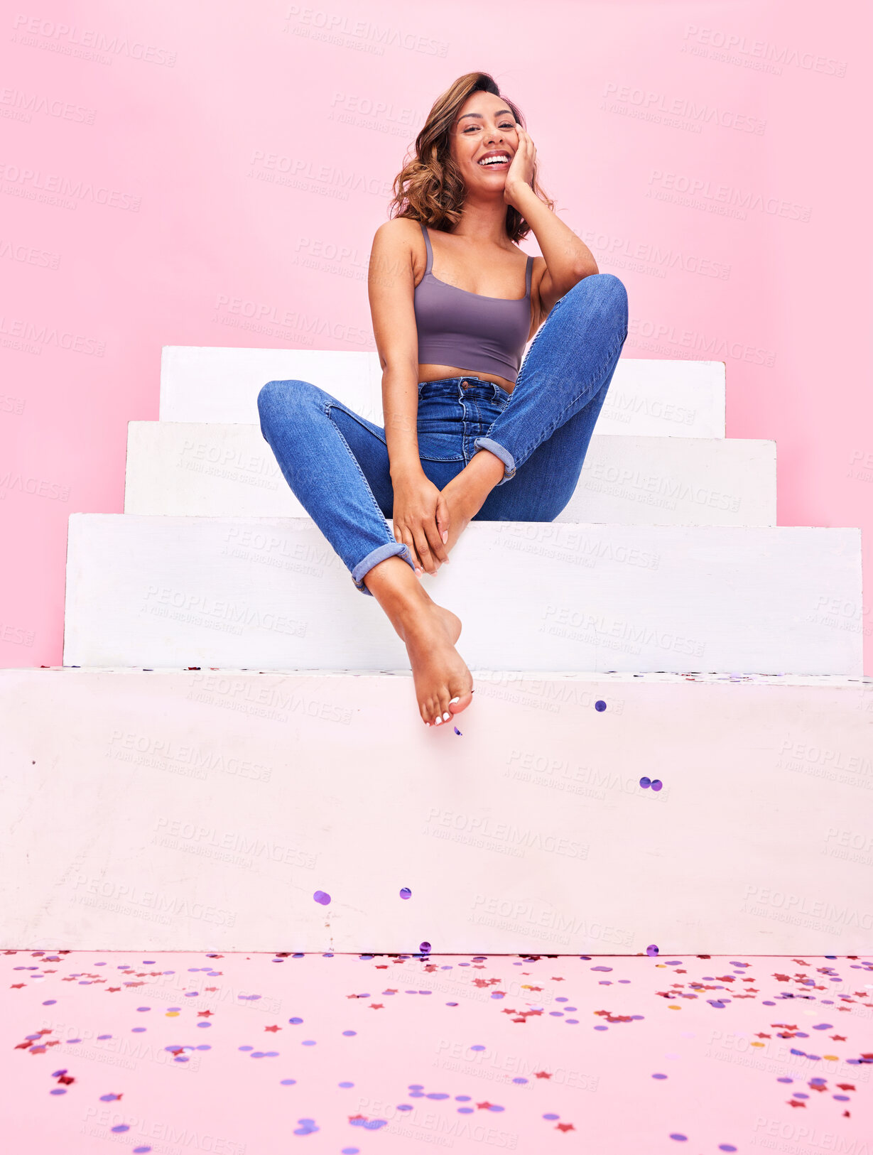 Buy stock photo Happy woman, confetti and steps portrait with smile, style and fashion with celebration sparkle. Studio, pink background and female model with party and birthday decoration with gen z confidence