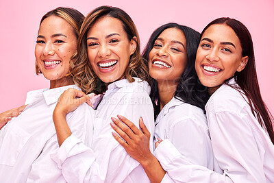 Buy stock photo Women, friends smile and portrait in studio with natural beauty, diversity and white shirt with laugh. Pink background, bonding and young female group together with inclusion, happy hug and wellness