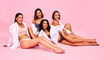 Portrait, lingerie and natural with woman friends on a pink background in studio for beauty or skincare. Smile, health and wellness with a happy female model group posing for diversity or inclusion