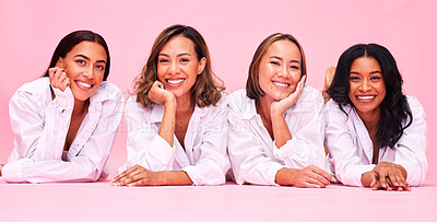 Buy stock photo Portrait, smile and lingerie with woman friends on a pink background in studio for natural skincare. Diversity, beauty and wellness with a female model group posing for health, inclusion or cosmetics