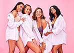 Women, friends and smile portrait in studio with beauty, diversity and white shirt with female community. Pink background, bonding and young model group together with inclusion, happy and wellness