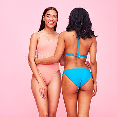 Buy stock photo Bikini, fashion and portrait of friends with diversity, beauty and style of women in swimsuit on pink background in studio. Swimming costume, face and model hug with body confidence and support