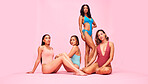 Swimsuit, portrait and women friends in studio for wellness, beauty or self love. Body positive, swimming costume or fashion swimwear and model group on pink background for diversity and inclusion