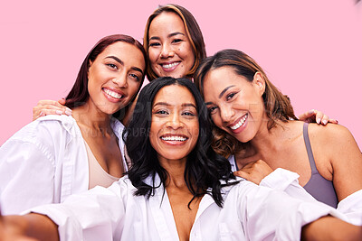 Buy stock photo Selfie, beauty and lingerie with woman friends on a pink background in studio for natural skincare. Diversity, health and wellness with the portrait of a female model group posing for inclusion