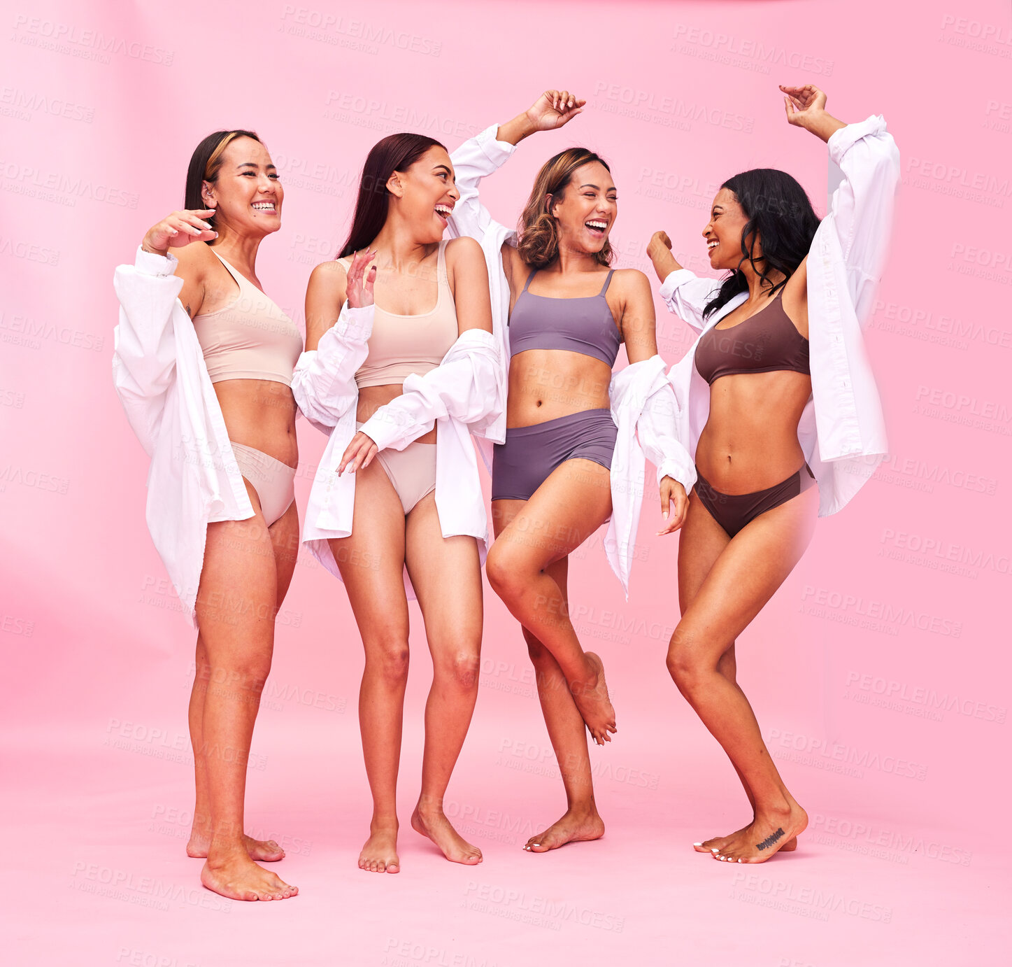 Buy stock photo Dancing, fun or women friends in underwear in studio on pink background for beauty or skincare. Lingerie party, health and wellness of model or dancer group for diversity, body positive or inclusion
