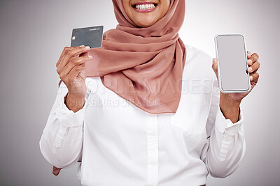 Buy stock photo Woman, hands and credit card with phone screen, fashion e commerce and online shopping mockup in studio. Happy muslim or islamic person with mobile fintech, banking and payment on a white background