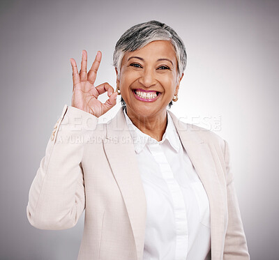 Buy stock photo Business woman, portrait and okay sign, success and support or like for Human Resources career in studio.  Mature HR person or professional indian manager, yes or excellence emoji on white background