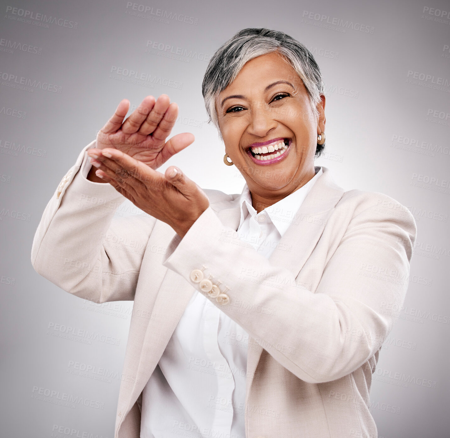 Buy stock photo Happy, money gesture and portrait of woman in studio with cashback, prize or financial freedom. Smile, excited and elderly female model with finance hand sign or emoji for savings by gray background.