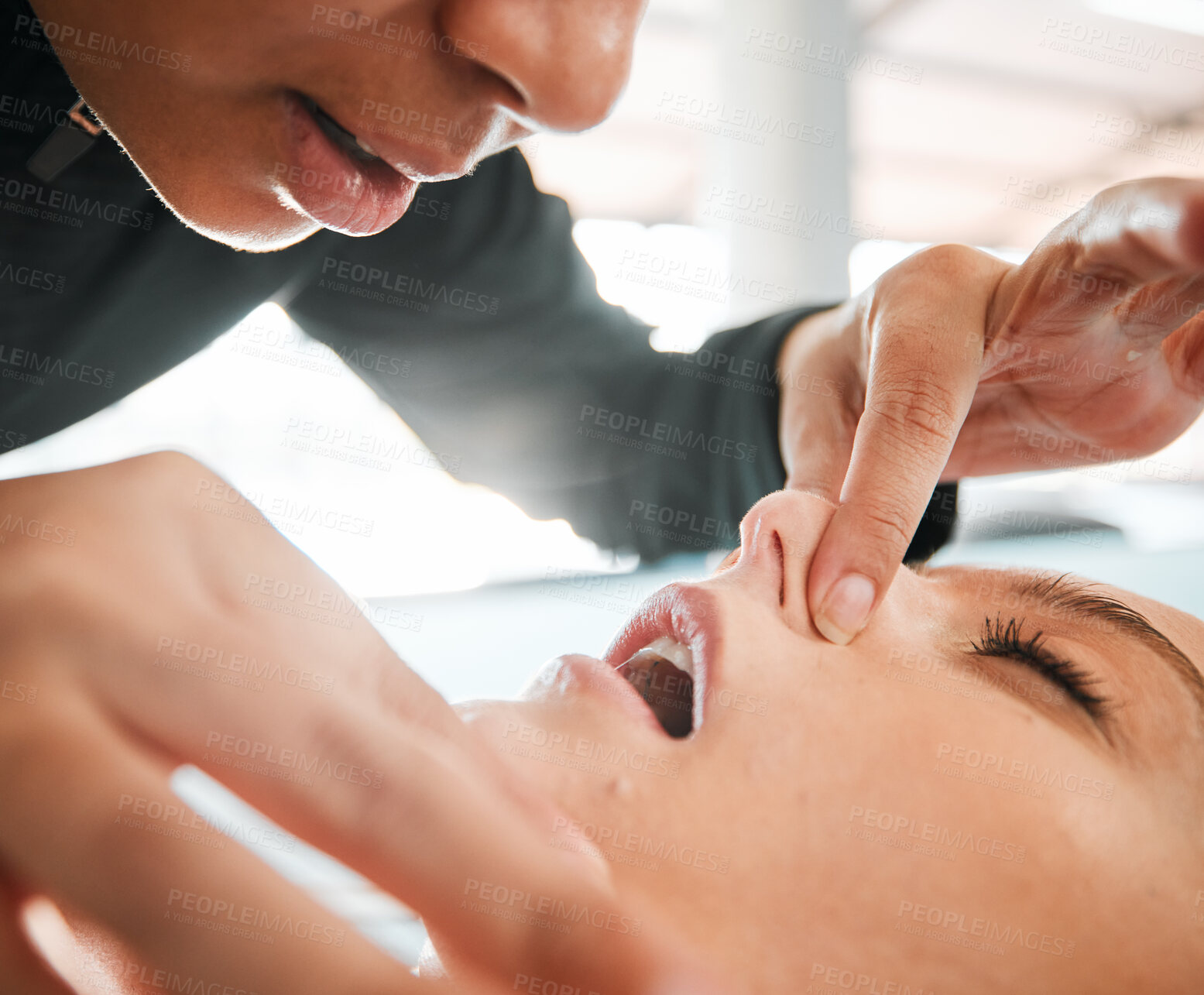 Buy stock photo Face, hands and open mouth, CPR and help with support, people and emergency with paramedic and safety. Lungs, breathing fail and resuscitation of a patient with healthcare, trauma and accident