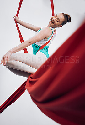 Buy stock photo Gymnastics, performance and happy woman in sports competition for professional fitness challenge or dancing. Professional, healthy and athlete with balance on silk isolated in studio white background