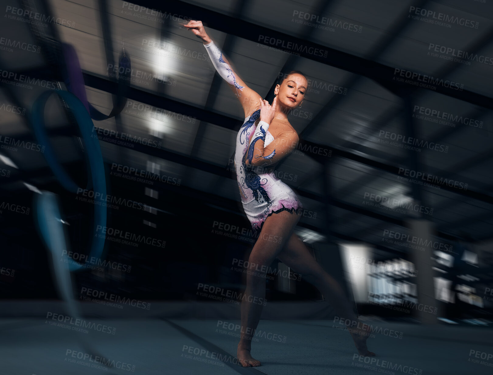 Buy stock photo Fitness, performance and motion blur with a dance woman in a gym for training or practice for a competition. Exercise, event and energy with a young gymnastic or rhythmic dancer in a workout studio