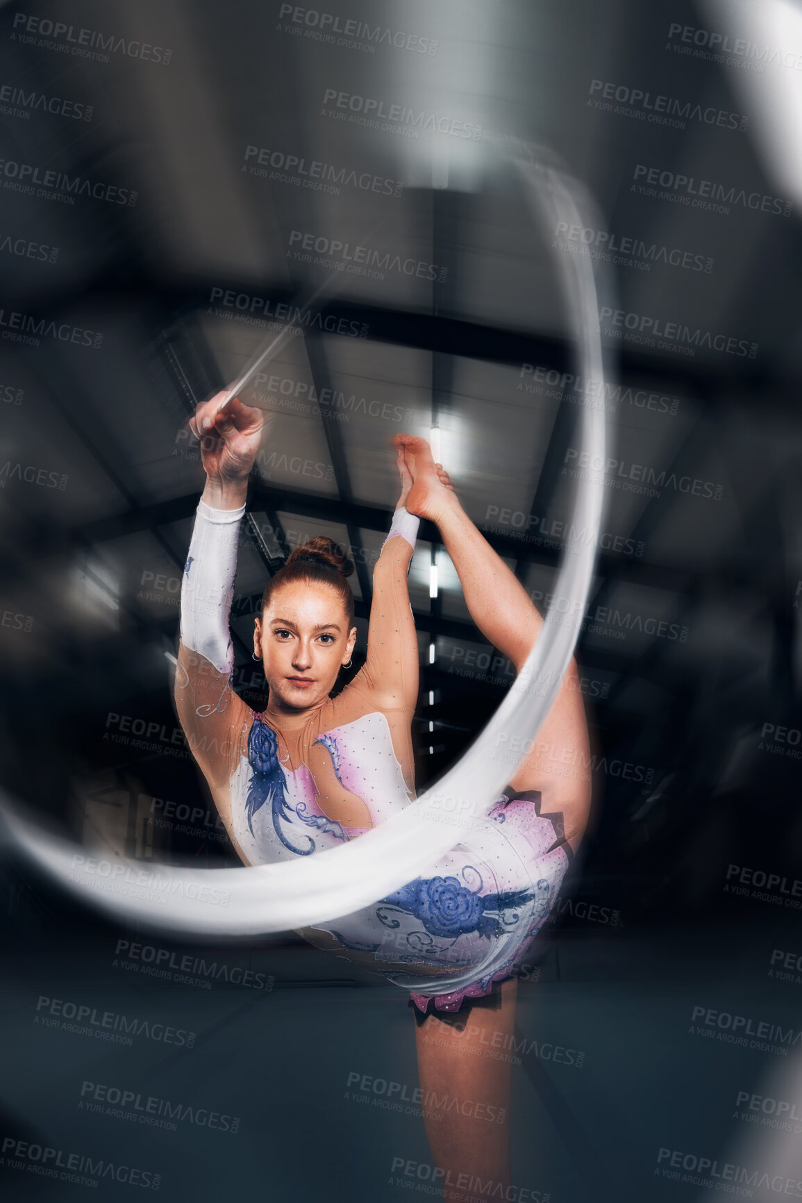 Buy stock photo Woman, portrait and motion for ribbon gymnastics in competition, performance or concert in dark arena. Flexible dancer, athlete and balance of action, agile training and talent in solo rhythm contest