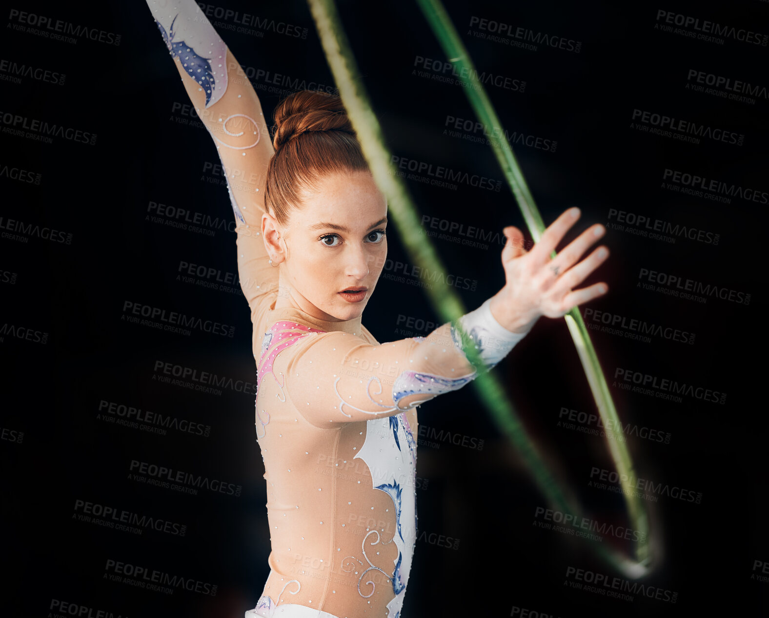 Buy stock photo Dance, concert with a gymnastics hoop and a woman in the gym for a performance showcase or practice. Training, energy and fitness with a female athlete on a dark background for routine or recital