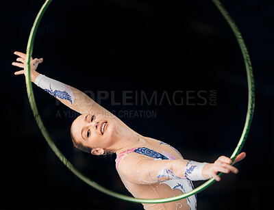 Buy stock photo Portrait, concert with a gymnastics hoop and a woman in the gym for a performance showcase or practice. Training, fitness and energy with a female athlete on a dark background for routine or recital