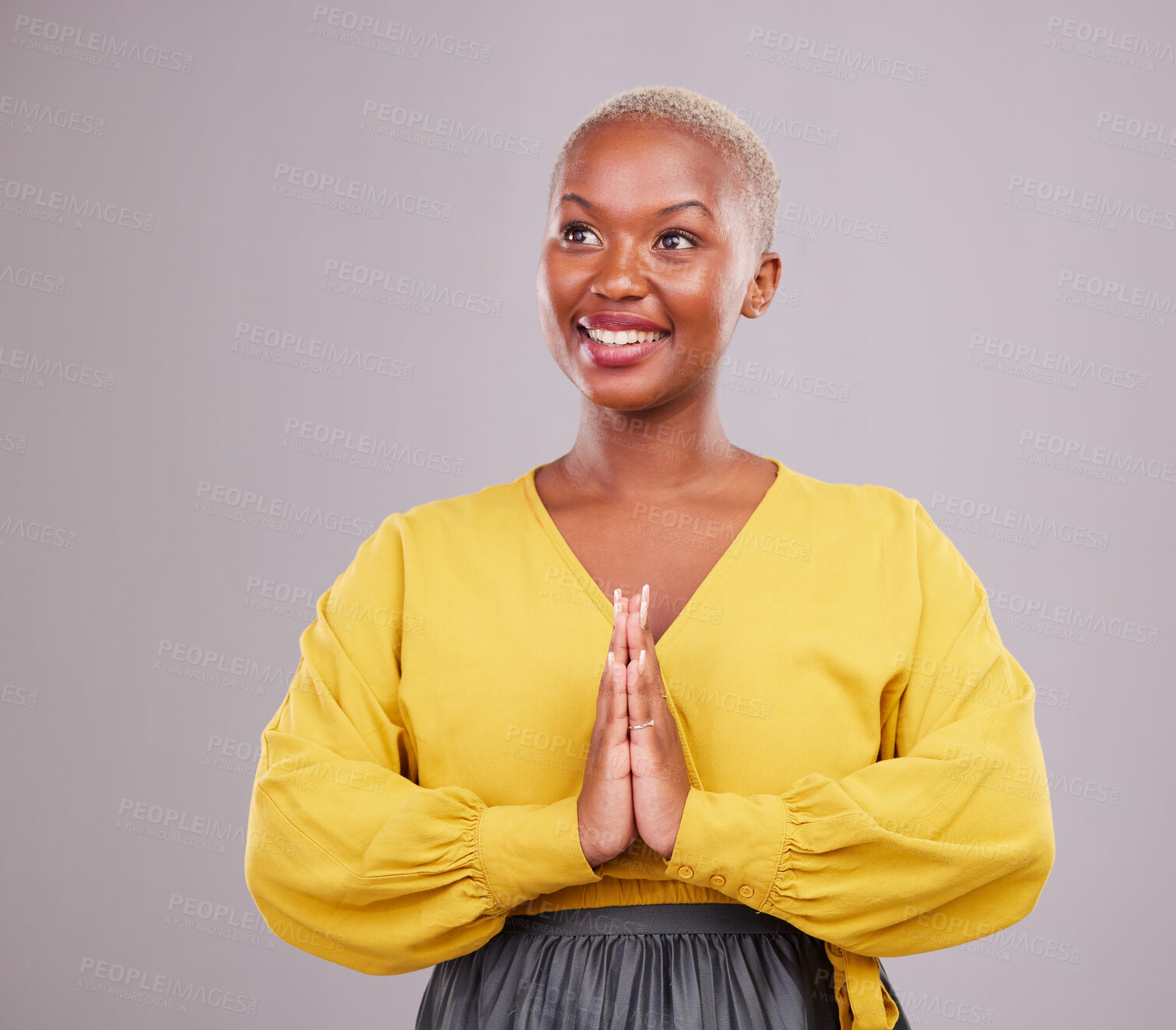 Buy stock photo Happy woman, prayer and thinking of faith, religion and hope or thank you for career opportunity on studio background. Christian or African person namaste, gratitude emoji and vision for ngo business