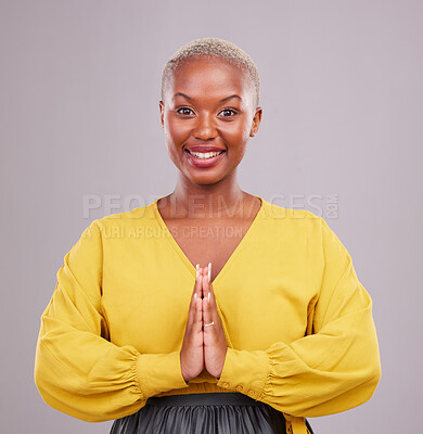 Buy stock photo Woman, prayer hands and portrait in faith, religion and hope or thank you for career opportunity on studio background. Christian or African person namaste, gratitude emoji and happy for ngo business