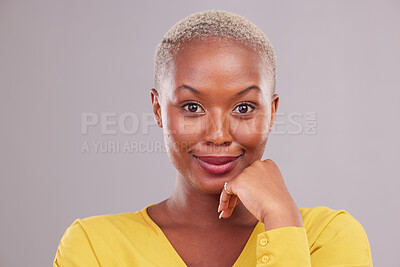 Buy stock photo Beauty, happy and portrait of black woman in a studio with makeup, cosmetic and face routine. Cosmetology, health and headshot of young African female model with facial treatment by a gray background