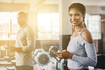 Buy stock photo Fitness, gym and portrait of a woman with a phone for communication, internet and workout app. Happy athlete person with a smartphone for texting, influencer post or online for wellness and health