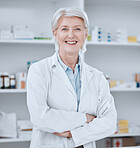 Pharmacy, arms crossed and portrait of woman pharmacist in dispensary, clinic or hospital for medicine. Medical, healthcare and senior professional doctor or drug store manager with checklist