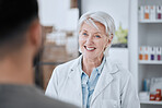 Happy senior woman, pharmacist and customer in consultation for medication or prescription at drugstore. Mature female medical or healthcare employee smile with patient in pharmaceutical at pharmacy