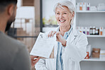 Happy senior woman, pharmacist and patient in consultation for medication or prescription at pharmacy. Mature female person, medical or healthcare employee consulting customer on pharmaceutical drugs