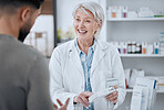 Happy senior woman, pharmacist and customer in consultation for medication or prescription at pharmacy. Mature female person, medical or healthcare employee consulting patient on pharmaceutical drugs