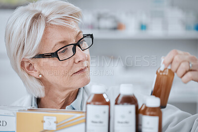 Buy stock photo Senior woman, pharmacist and inventory inspection, medicine or checking stock on shelf at drugstore. Mature female person, medical or healthcare employee reading pharmaceutical product at pharmacy