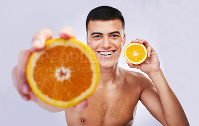 Buy stock photo Happy man, portrait and orange in vitamin C, diet or skincare against a white studio background. Male person or model smile with organic citrus fruit for natural nutrition, health and wellness