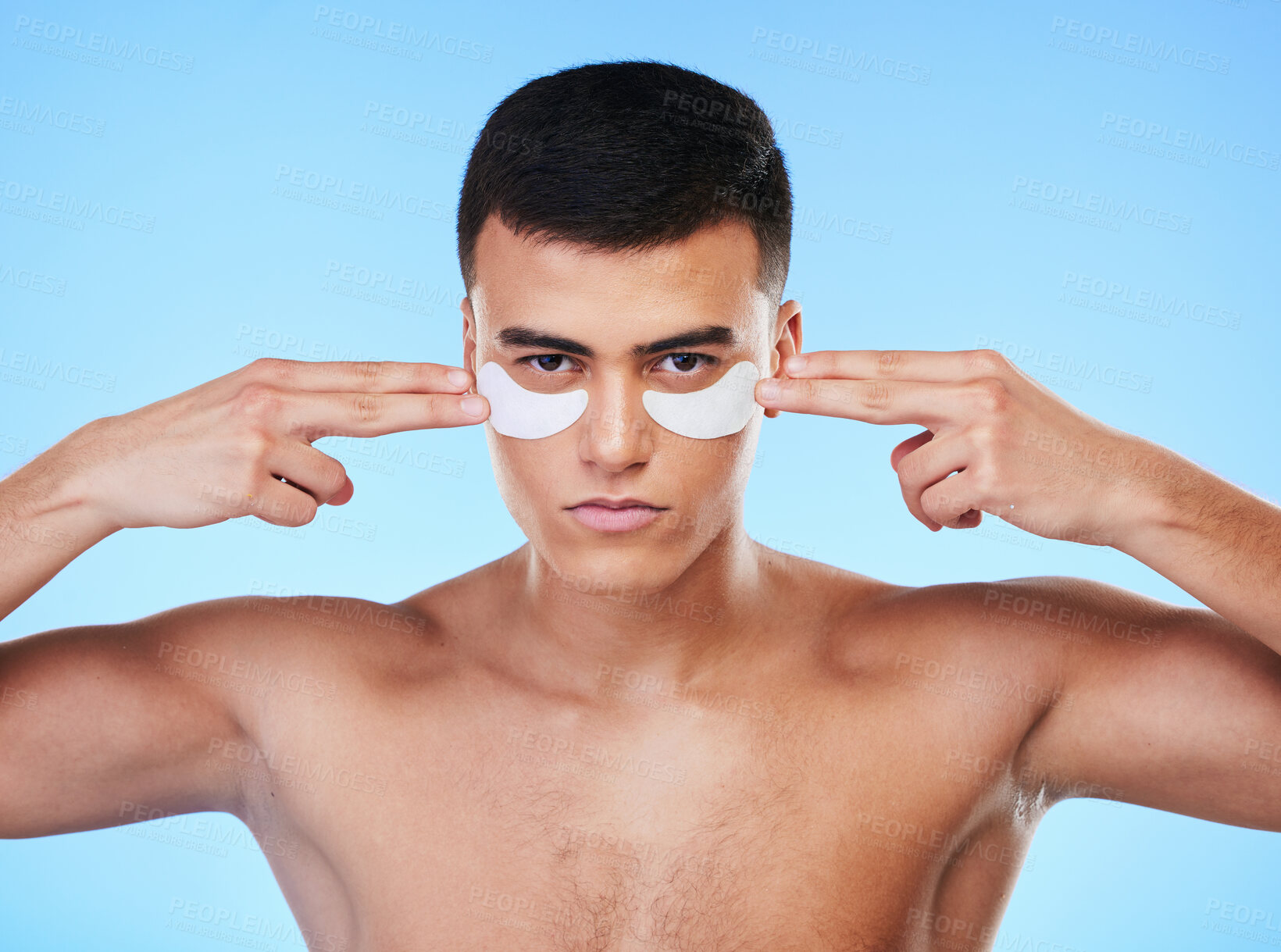 Buy stock photo Man, beauty and face with eye patch for skincare, grooming and clean with hygiene isolated on blue background. Skin treatment, cosmetics product and wellness, portrait and dermatology in a studio