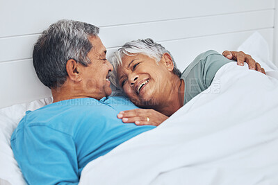 Buy stock photo Bed, smile and senior couple with love, relax and marriage with retirement, relationship and conversation. Morning, elderly man and old woman with romance, bedroom and trust with peace, home and care