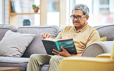 Buy stock photo Home, relax and senior man with a book, retirement and calm with a story in a living room. Old person, calm and pensioner in a lounge, novel or literature with a hobby, self help or reading on a sofa