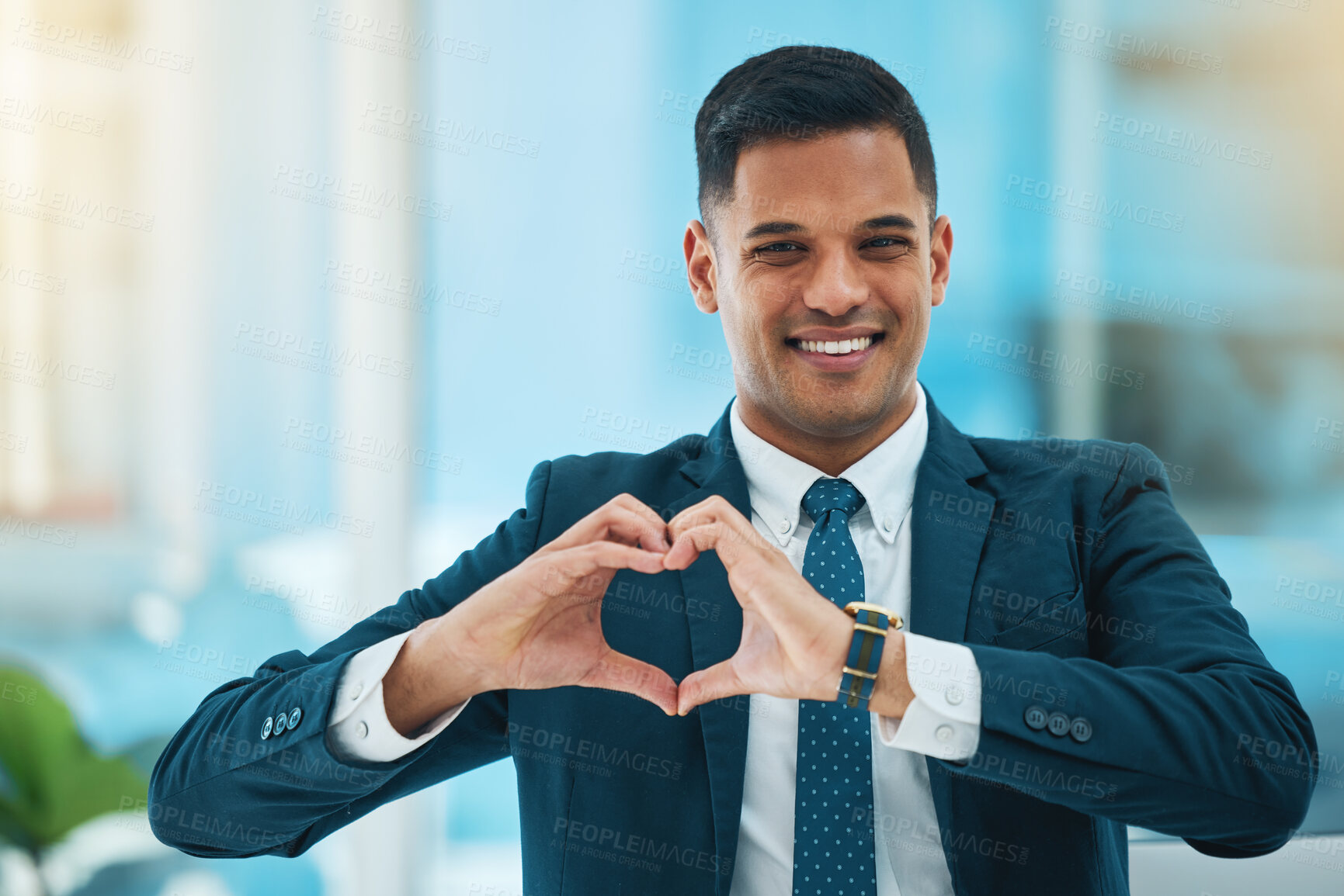 Buy stock photo Hands, heart and portrait of business man for love, care and kindness of like emoji in office. Happy corporate worker with finger shape for thank you, trust and sign of hope, support or icon of peace